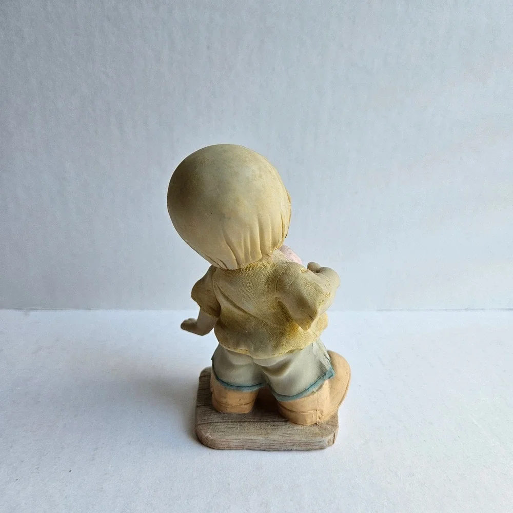 Vintage Style Boy Playing Paddle Ball Resin Figurine Collectible Home Decor